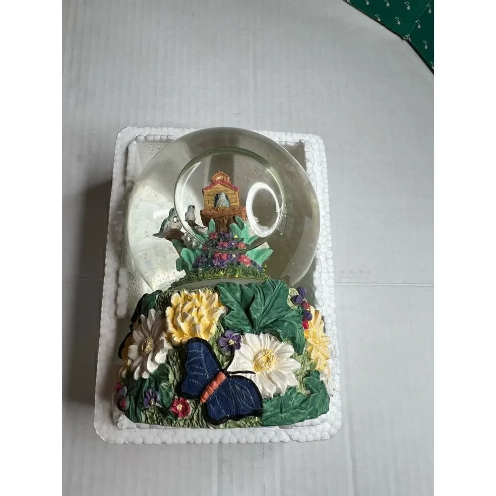 Vintage birdhouse musical water globe